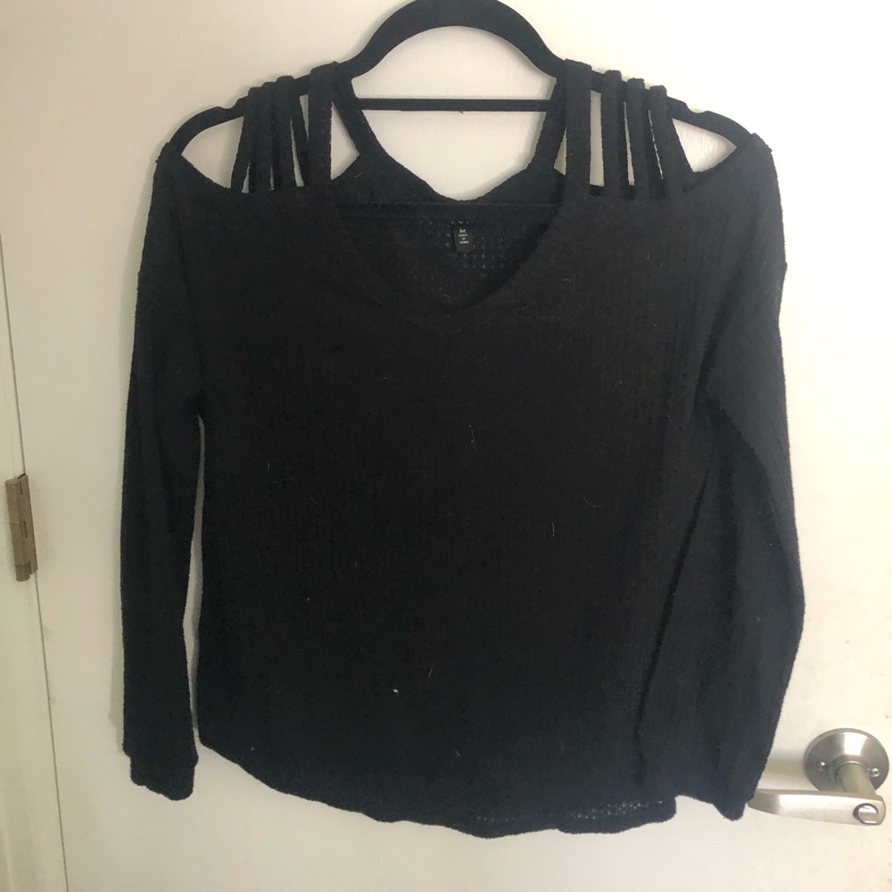 Exposed shoulder black sweater